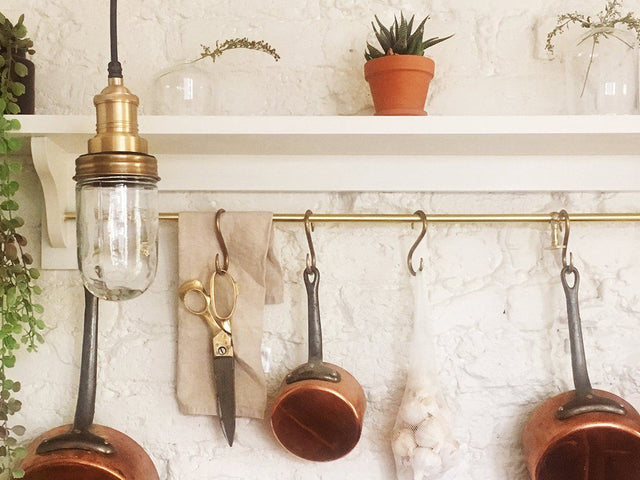 Brass waterproof pendant in a kitchen decor
