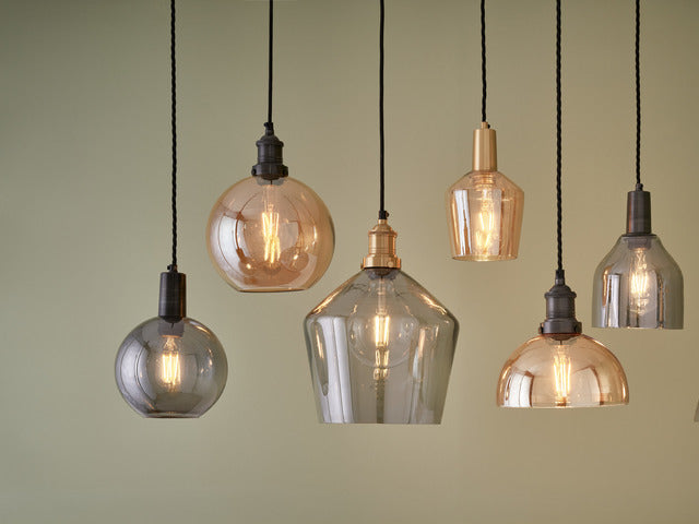 A collection of glass pendants with Edison bulbs 