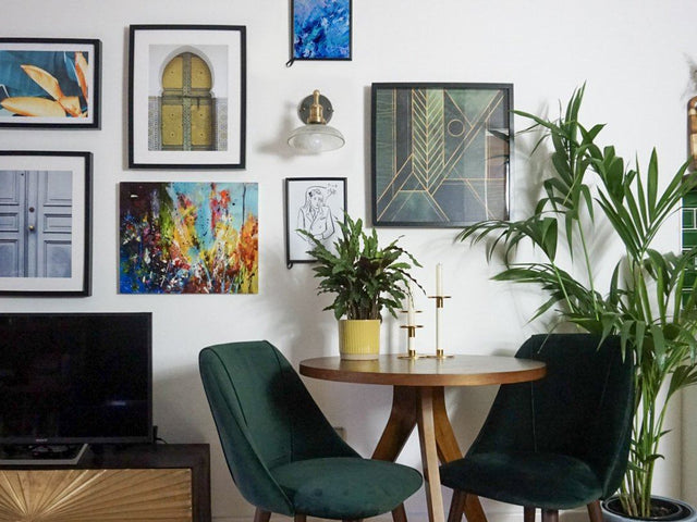 Artwork and vintage lighting in a jewel tone interior 