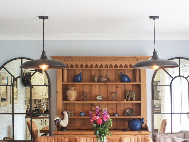 A traditional home interior with industrial lighting