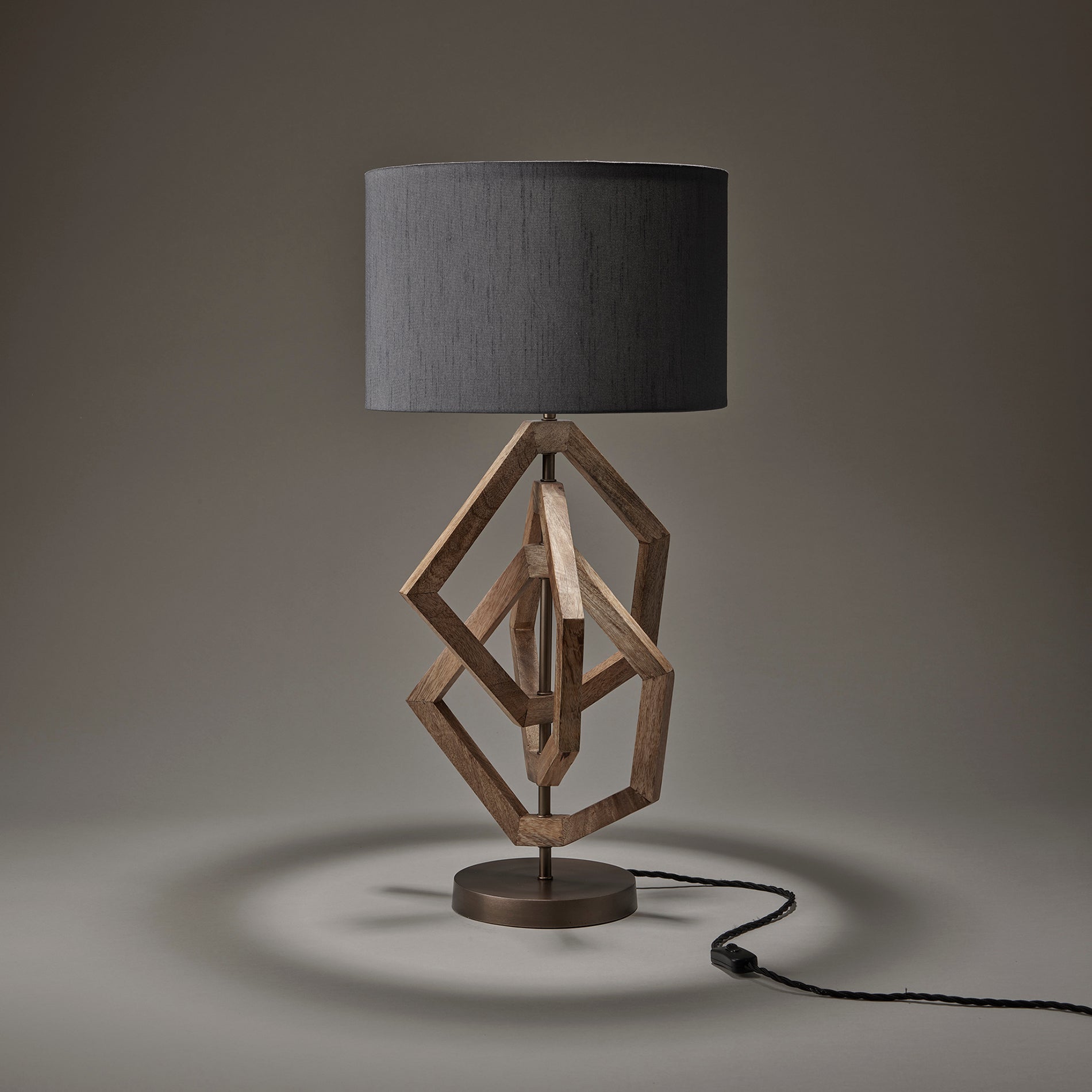 wooden geometric polygon table lamp in natural with large drum lampshade in grey