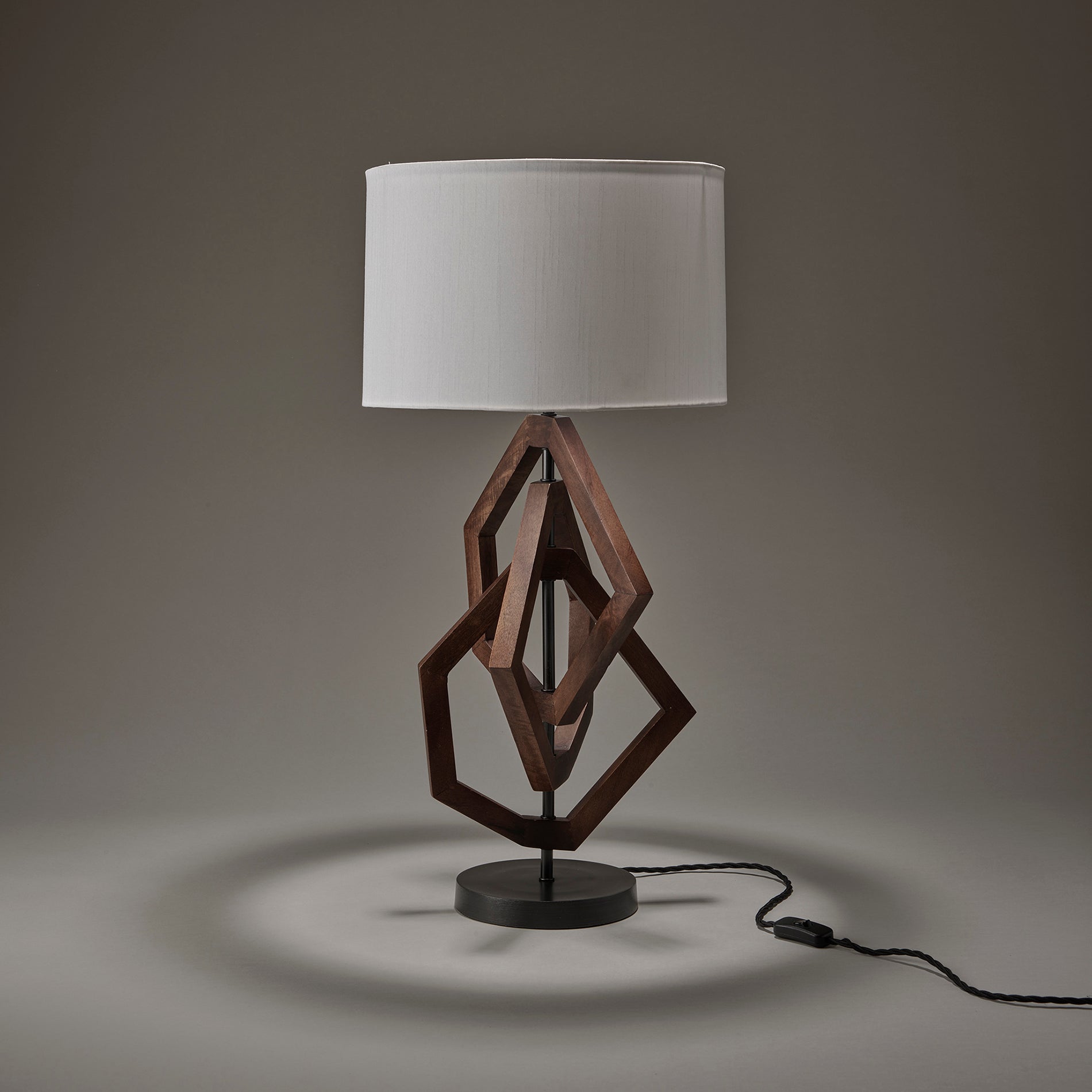 wooden geometric polygon table lamp in walnut with large drum lampshade in white