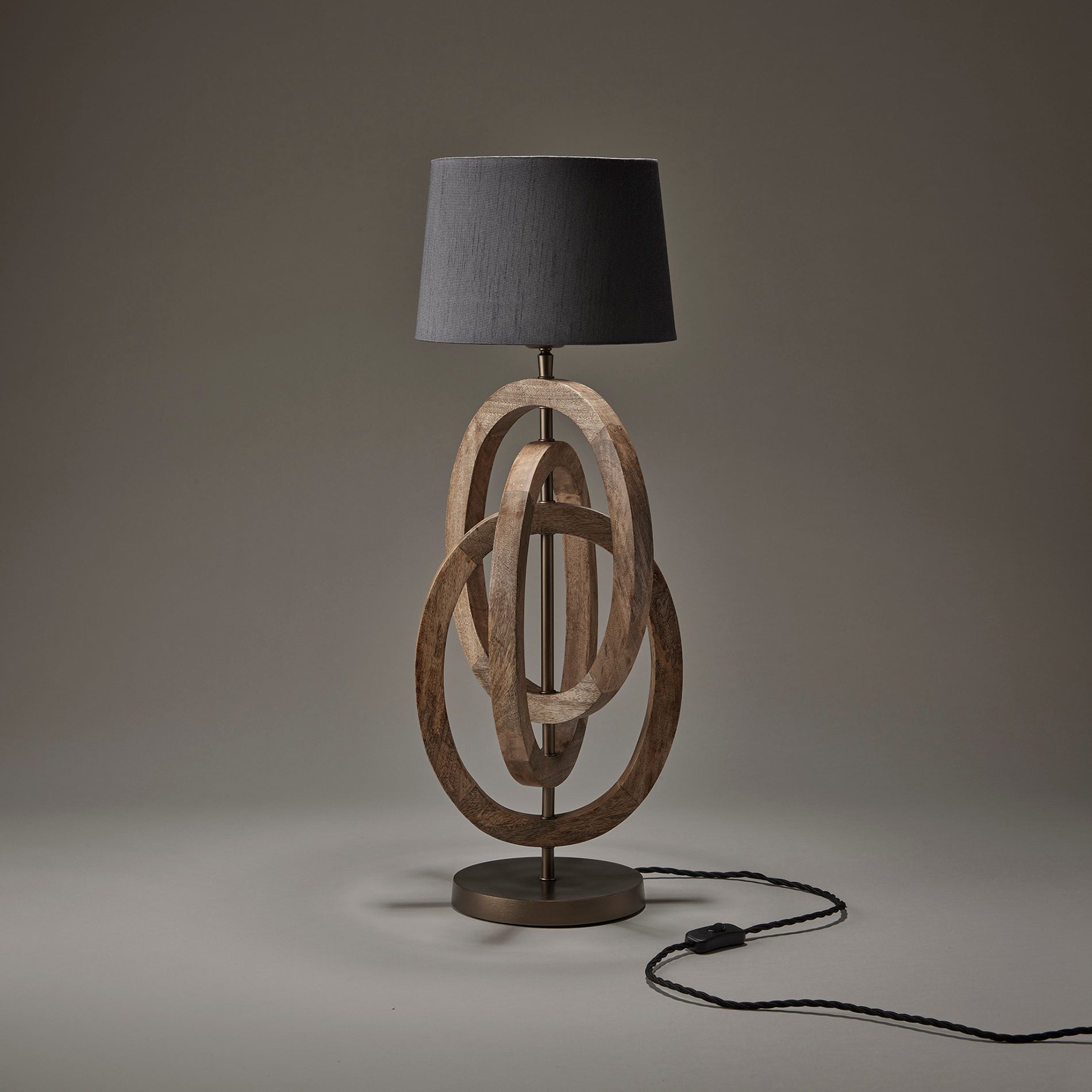 wooden geometric circle table lamp in natural with small empire lampshade in grey